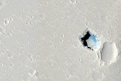 Chain of Cratered Cones near Hephaestus Fossae 