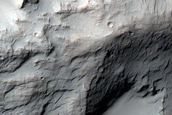 Kaolinite-Alunite Stratigraphy of Potential Hydrothermal System in Crater