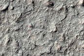 Bedrock Exposed by Impact Crater 