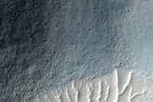 Bedrock Exposed by 3-Kilometer Impact Crater in Tyrrhena Terra