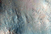 Crater Cut by Wrinkle Ridge