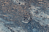 Material Exposed in Plains South of Louros Valles