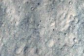 Curvilinear Flat-Topped Ridge and Wrinkle Ridge West of Maja Valles