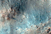 Crater Cut by Wrinkle Ridge