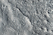 Layered Feature in Crater in Galaxias Fossae