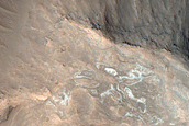 Fan at Channel Terminus and Light-Toned Layered Material in Juventae Chasma