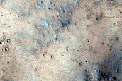 Possible Layering Under Ejecta in Syria Planum