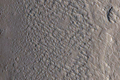 Valley-Channel Transitions in Crater in Arabia Terra