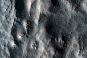 Ridges and Troughs in Debris Apron in Deuteronilus Mensae
