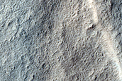 Cataract Channels Crossing Wrinkle Ridge in Ejecta of Negele Crater