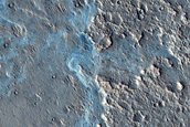 Fan-Shaped Deposit with Floor Outcrop in Camichel Crater
