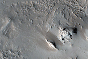 Cratered Features in Olympus Mons Aureole