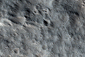 Channel Cutting through Lava Flows on Eastern Flank of Olympus Mons