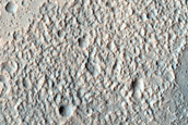 Layers on Edge of Crater Northeast of Hellas Planitia