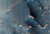 Sinuous Channel Form on South Rim of Baldet Crater