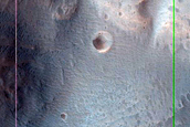 Fan Shaped Landforms at Valley Termini in Crater