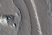 Conical Feature near Channels and Fissures in Tharsis Region