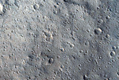 Tombaugh Crater and Terrain to South