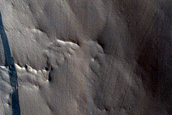 Dark and Bright Slope Streaks in Arabia Terra