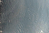 Fresh Craters Overlying Grabens South of Pavonis Mons