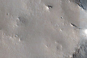Mesas and Channel Features in Central Arabia Terra