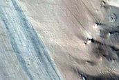 Bright and Dark Slope Streaks in Arabia Terra