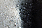 Rahe Crater near Ceraunius Tholus