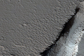 Elongated Collapse Pit in Ceraunius Fossae