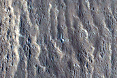 Contact between Medusae Fossae Formation and Apollinaris Mons Flank