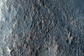Dipping Layers in Crater near Reull Vallis