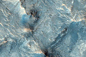 Phyllosilicate-Rich Central Pit and Landslide in Tyrrhena Terra