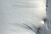 Transitioning Streaks on Cassini Crater Floor