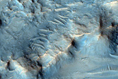 Channel Cutting Rim of Crater in Tyrrhena Terra
