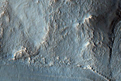 Deep Exit Breach from Well-Preserved 5-Kilometer Diameter Crater