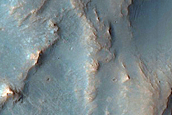 Flows and Pitted Material in Terra Sirenum