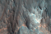 Layered Deposits within Depression in Osuga Valles