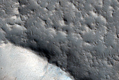 Oblique Impact which Resembles Volcanic Collapse Features