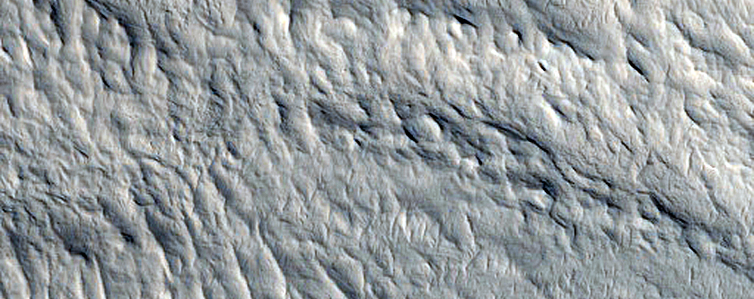 Layers in Butte in Tikhonravov Crater