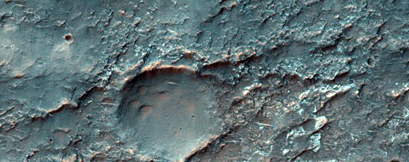 Valley and Light-Toned Exposure in Channel in Terra Cimmeria