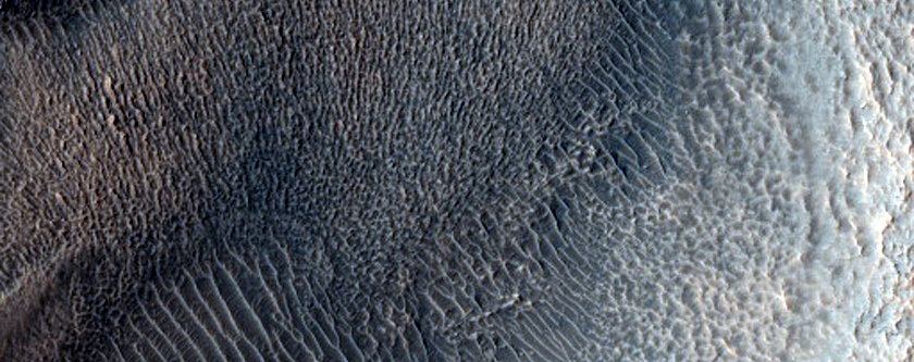 Dipping Layers in Crater in Southern Mid-Latitudes