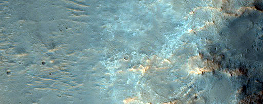Channels Cutting Crater Rim in Tyrrhena Terra