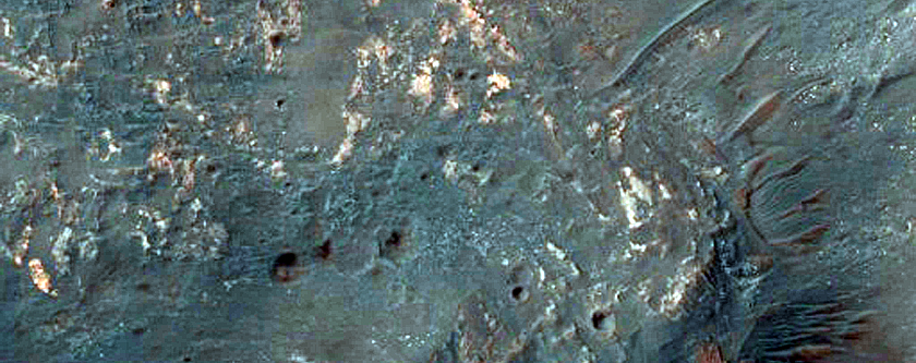 Western Portion of Well-Exposed 6-Kilometer Diameter Crater in Ladon Valles