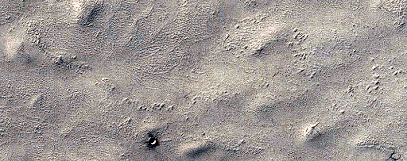 Candidate Recent Impact Site West of Promethei Rupes