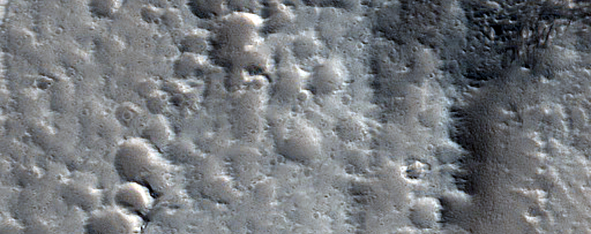 Channels From Trough in Tantalus Fossae