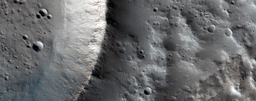 Channel and Crater Ejecta in Northwest Alba Patera
