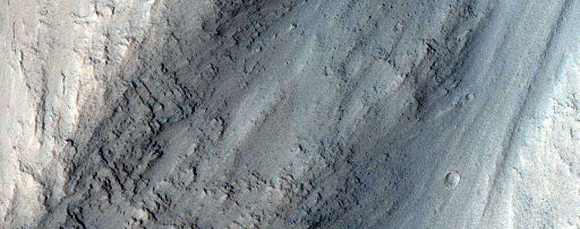 Small Impact Crater Exposed by Erosion