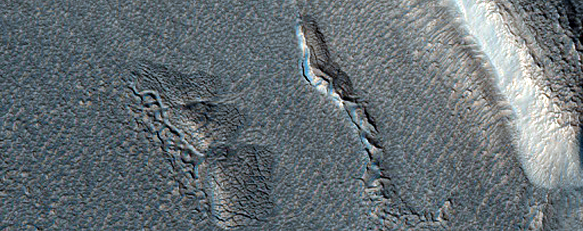Dipping Layers in Crater in Ismeniae Fossae