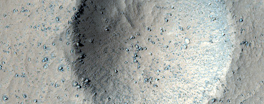 Well-Preserved Small Crater in Syria Planum