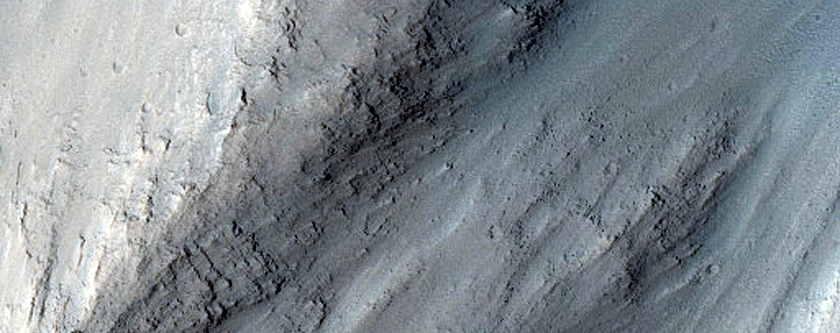 Small Impact Crater Exposed by Erosion
