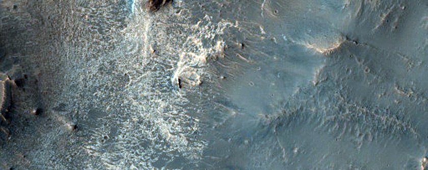 Light-Toned Deposits along Eastern Tithonium Chasma Floor